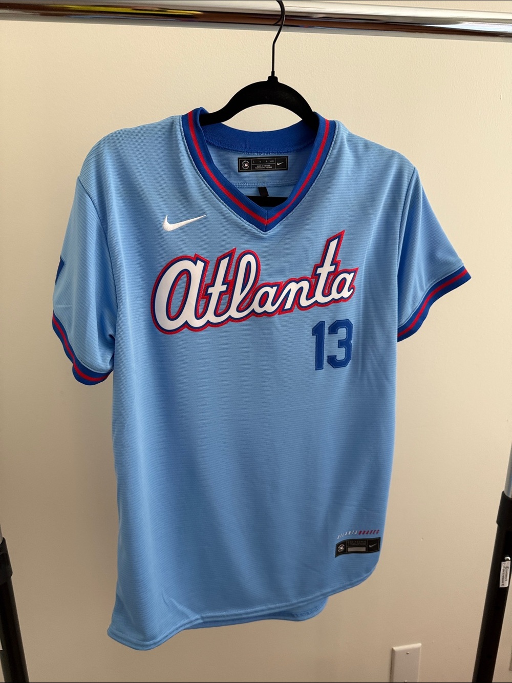 City Connect Nike Light Blue Braves Baseball Jersey. Large youth or sm in ladies